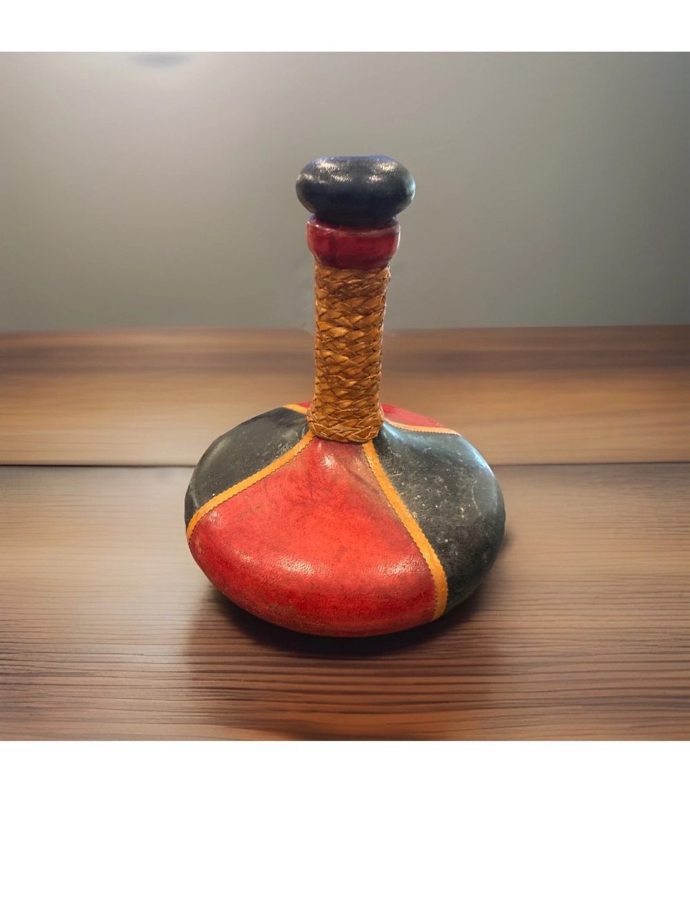 Handcrafted Red and Black Decorative Bottle with Woven Neck